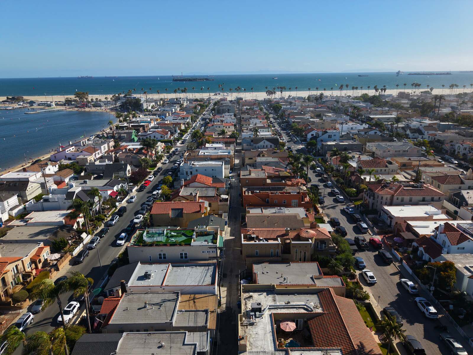 Belmont Shore neighborhood — aerial view looking down the street grid toward the beach and ocean beyond