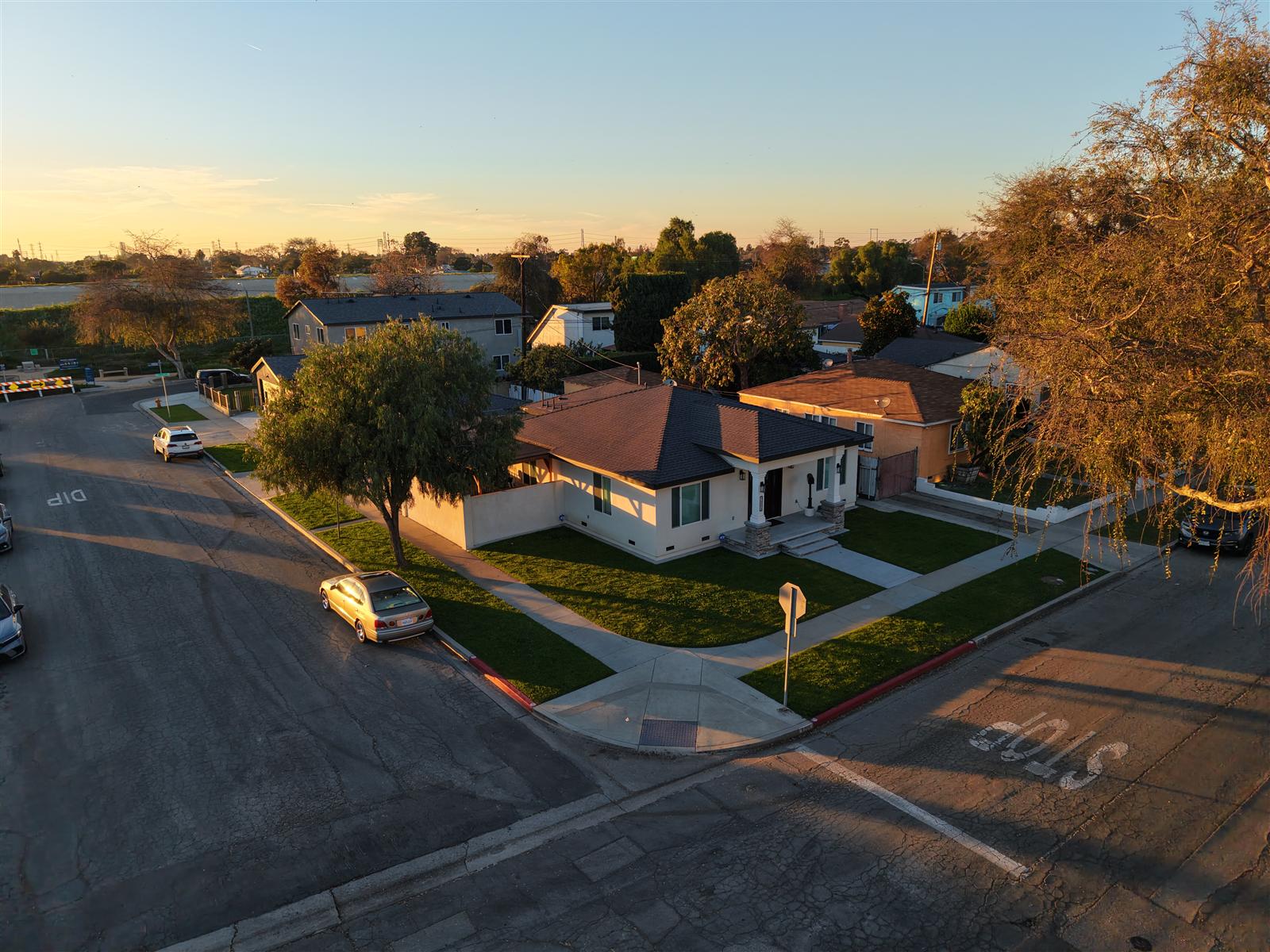 Westside Listing — golden hour aerial view of a Long Beach residential property